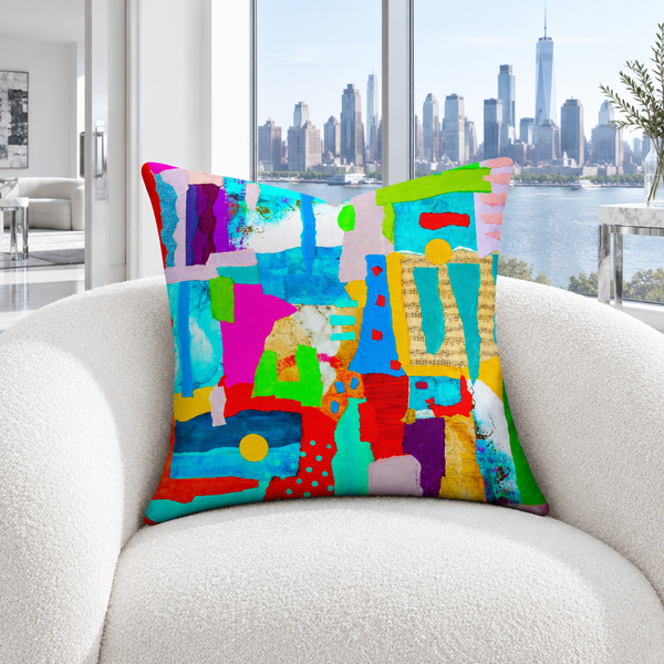 Symphony of Colors pillow in a cool-white river-view room